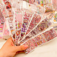kersAssorted decorative sticker rolls with colorful cartoon style designs for planners, scrapbooks, journals, and crafts