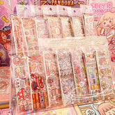 Display of decorative sticker rolls with colorful journal, planner, and scrapbook designs in assorted themes