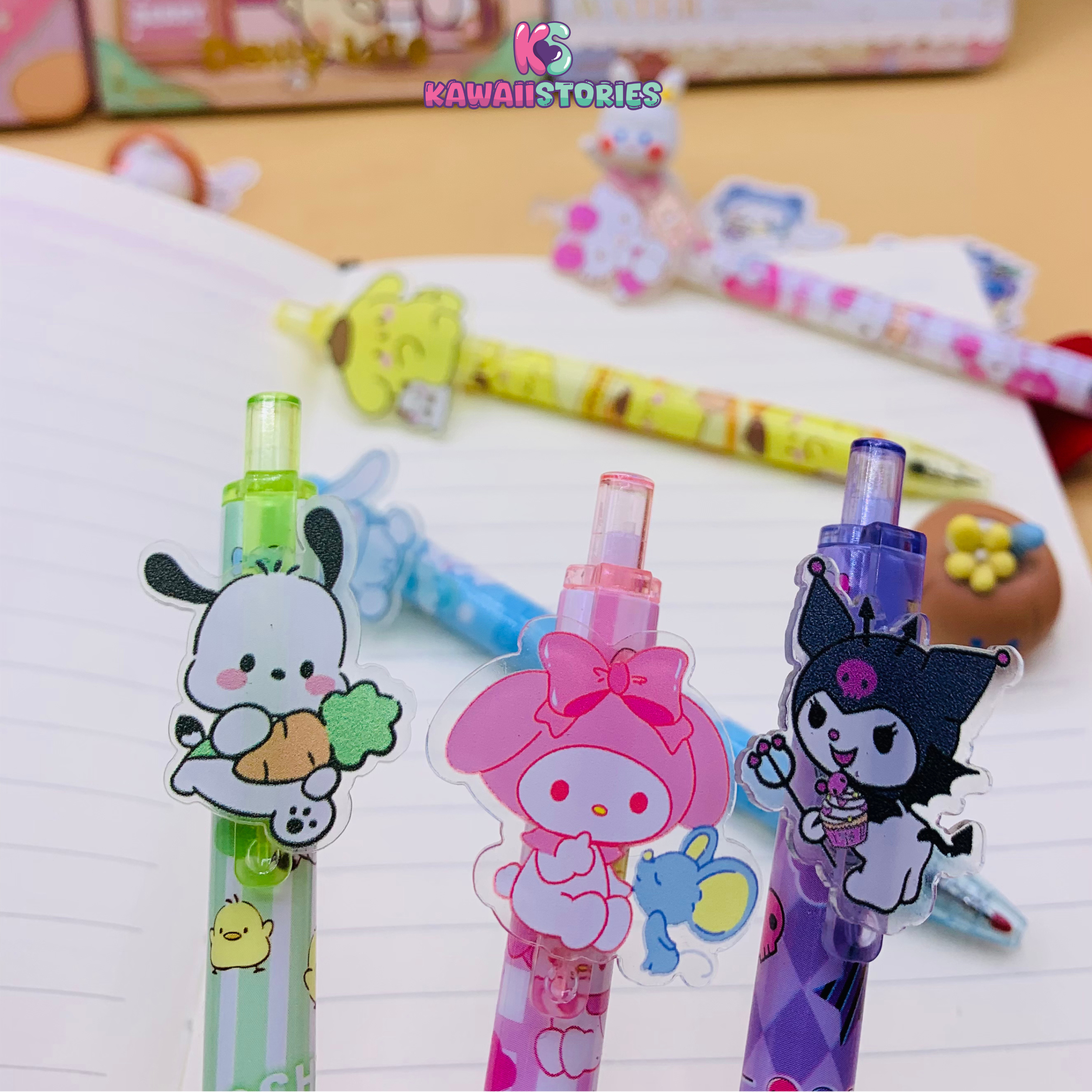 Colorful acrylic patch gel pens standing upright with cartoon toppers
