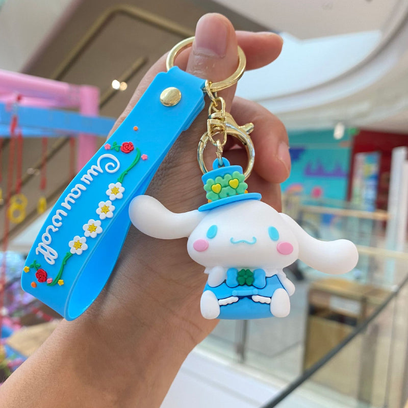Blue 3D character keychain with floral strap and metal ring