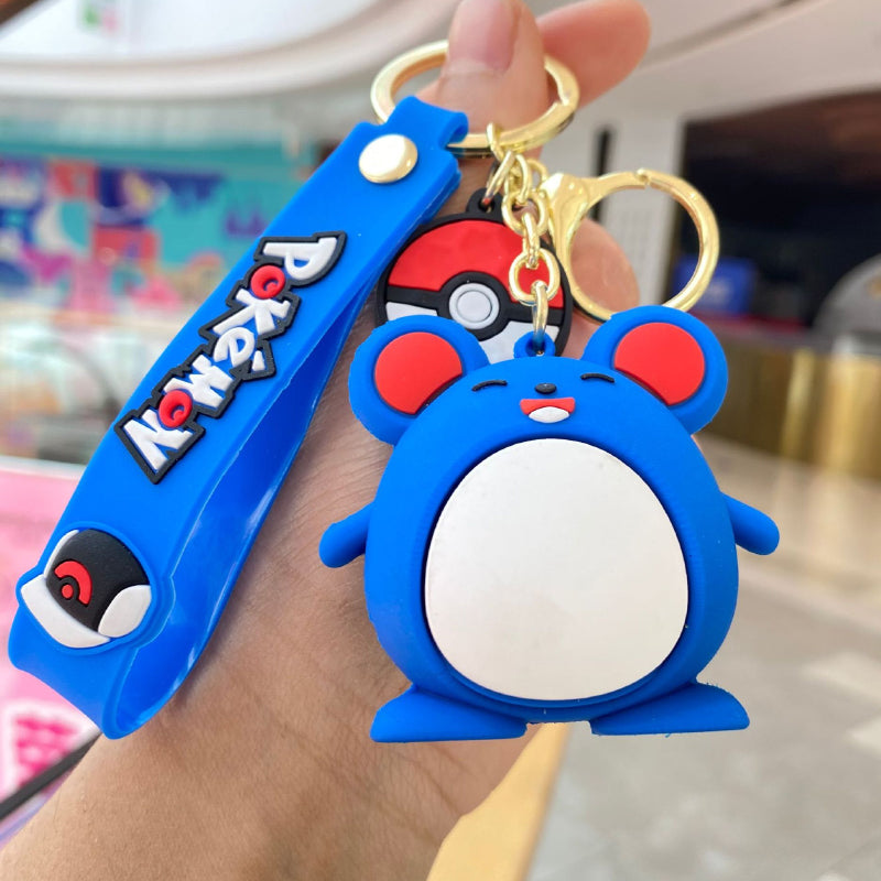 Blue soft silicone creature keychain with gold-tone hardware
