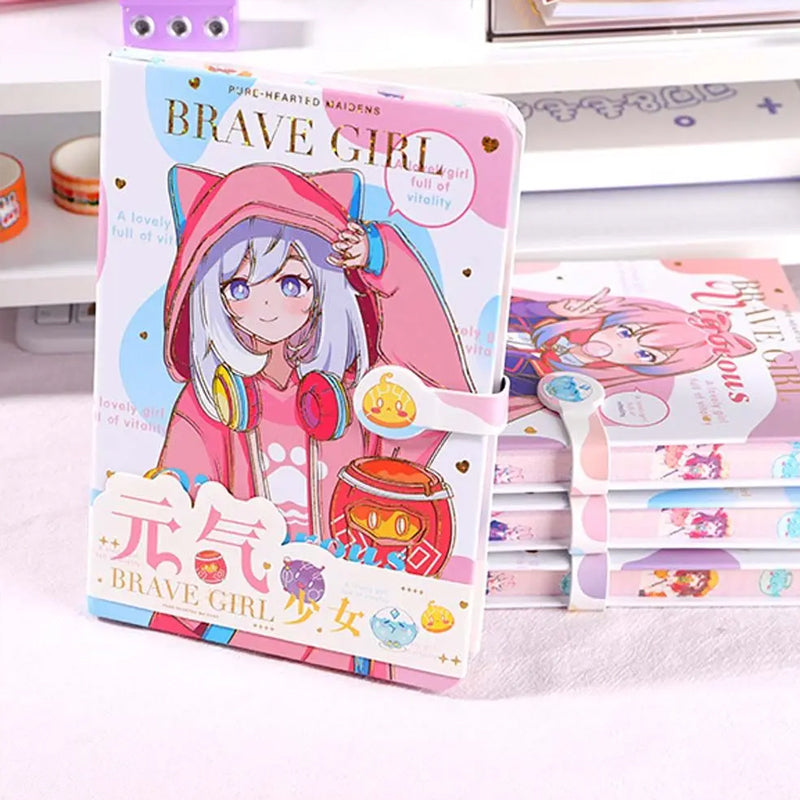 Standing Brave Girl pink kawaii anime notebook with magnetic buckle closure beside stacked journals.