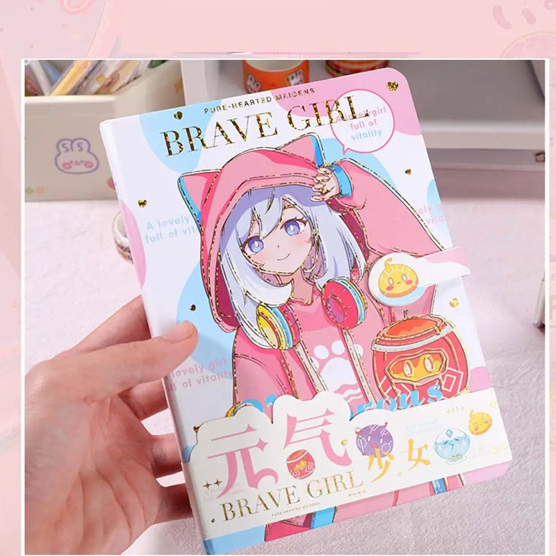 Hand holding a Brave Girl kawaii anime magnetic notebook with pastel hardcover and cute character illustration