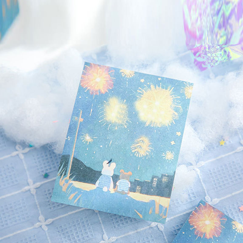 Fantasy bunny notebook with colorful fireworks under a starry night sky