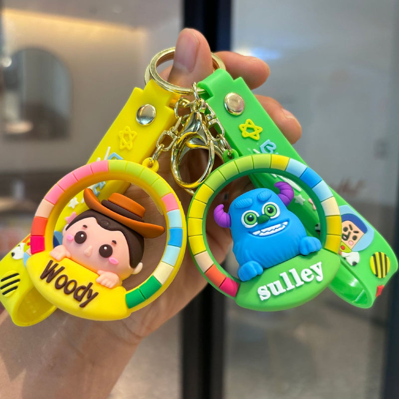 Colorful cartoon character rubber keychains with round frames and matching straps