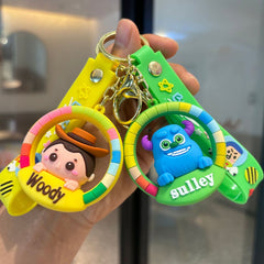 Colorful cartoon character rubber keychains with round frames and matching straps