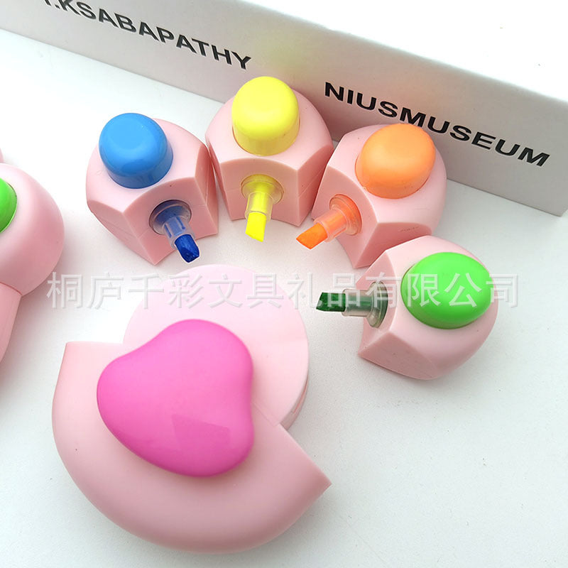 Cat paw shaped highlighters in pink, yellow, white and gray