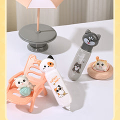Pastel cat correction tape dispensers in pink, white, and gray