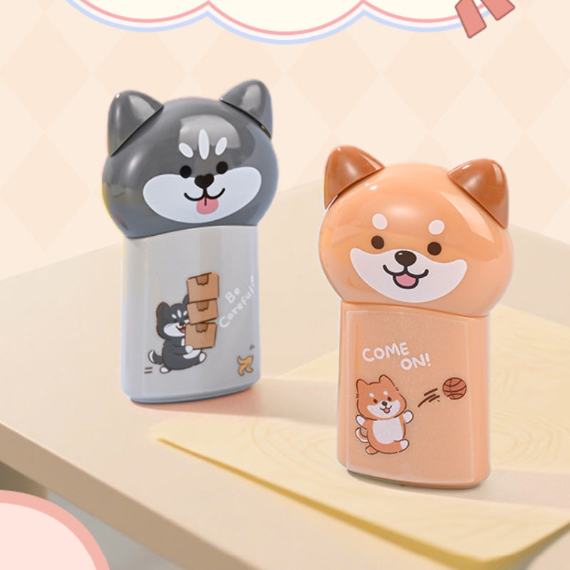 Gray puppy and orange cat correction tape dispensers with printed designs
