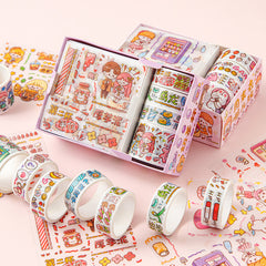Cartoon character washi tape rolls displayed beside matching decorative sticker sheets