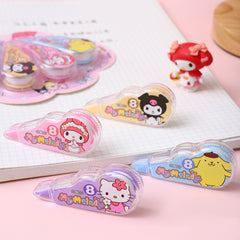 Colorful cartoon correction tape dispensers in pink, yellow, blue, and purple