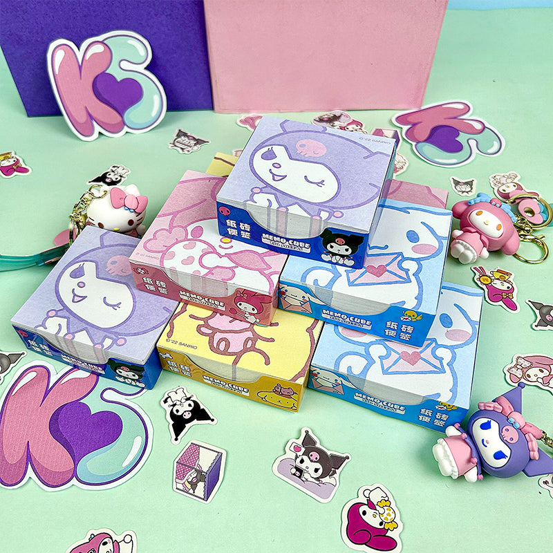 Colorful decorative memo note pads stacked with cute stationery accessories