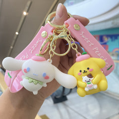 Cute cartoon keychain set with pink character designs