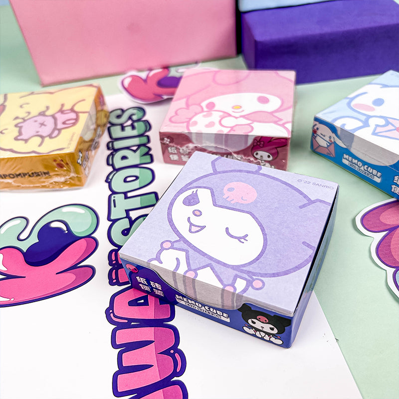 Cute cartoon memo pad displayed with colorful stationery decorations