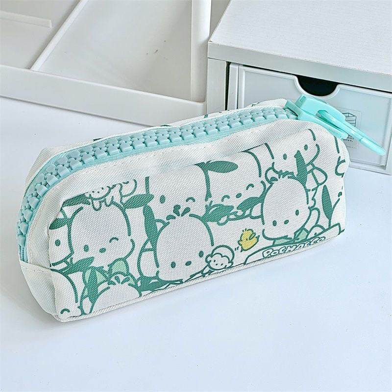 Front view of a large zipper pencil case with pastel cartoon print and roomy storage compartment