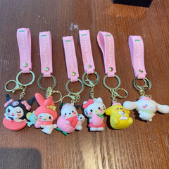Collection of cute pink cartoon keychains with soft rubber pendants