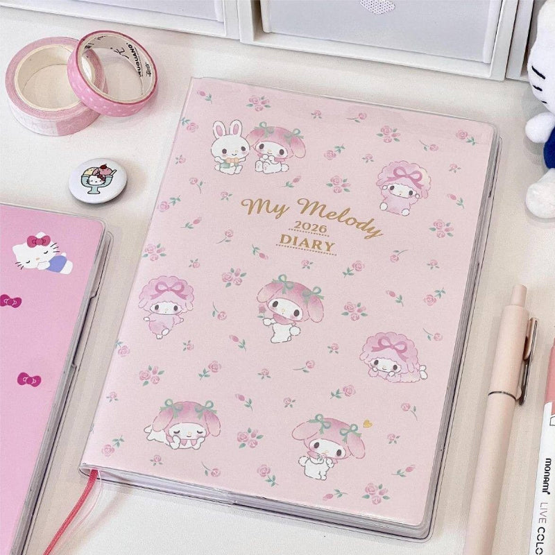Cute pink rabbit themed 2026 weekly planner with a floral pastel cover design