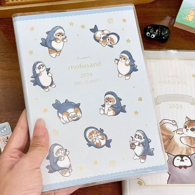 Cute shark cat themed 2026 weekly planner with a B6 PU leather cover and adorable illustrated design
