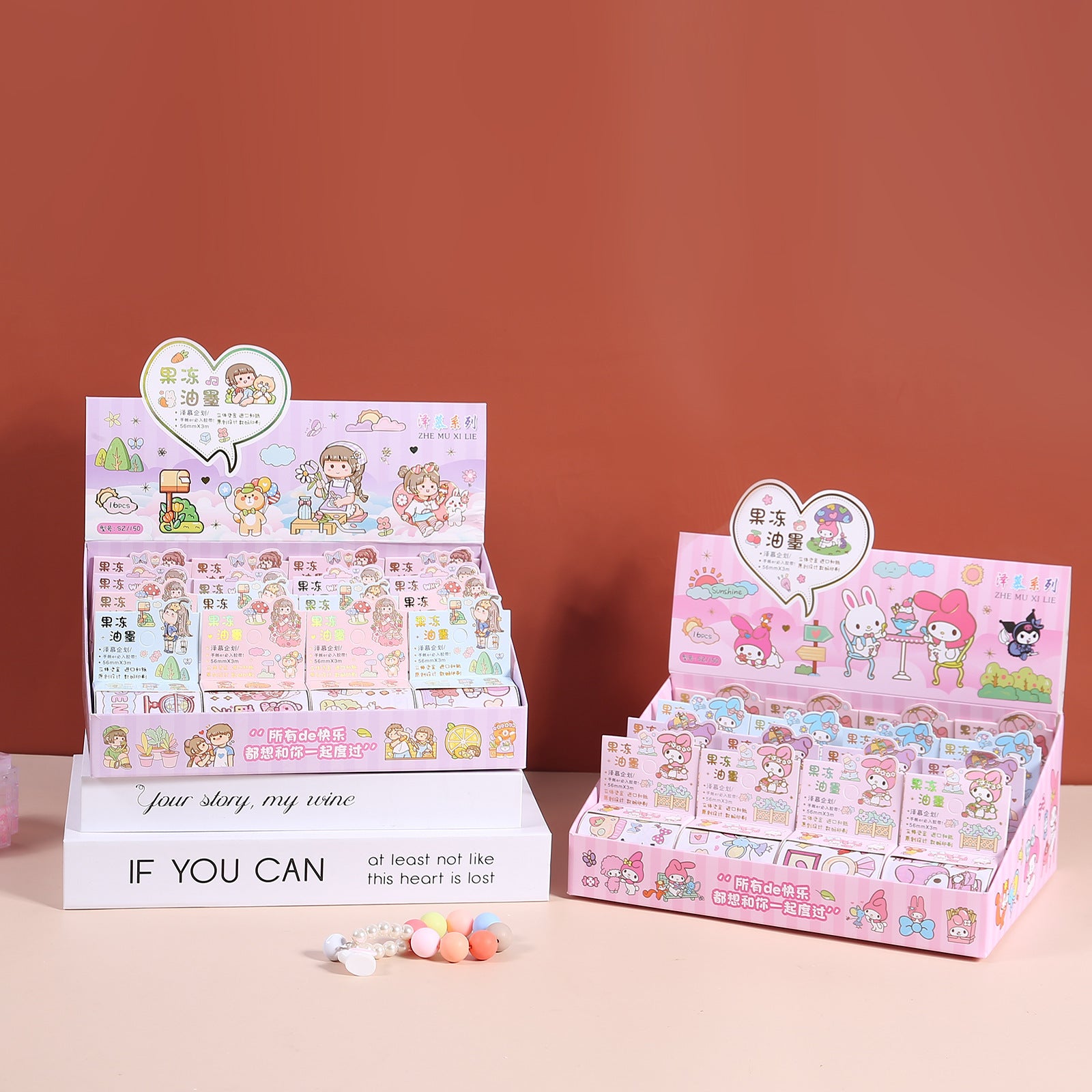 Side by side display of decorative jelly ink tape sticker roll collections with assorted pastel designs for journals and planners