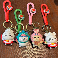 Dessert pet keychain collection featuring red, green, pink, and blue braided straps