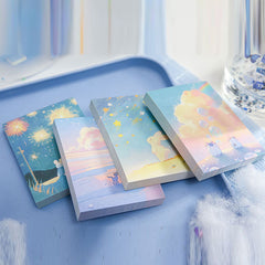 Pastel fantasy bunny notebooks arranged in assorted dreamy designs