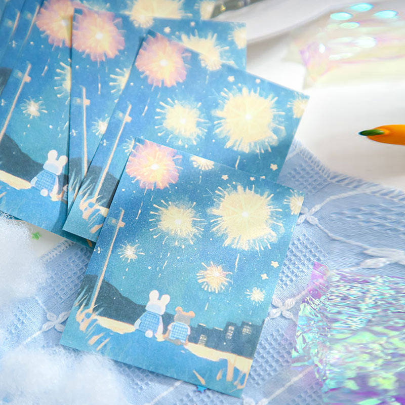 Pastel blue bunny notebook with colorful fireworks and night sky artwork