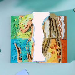 Top view of a layered Great Wall paper sculpture calendar