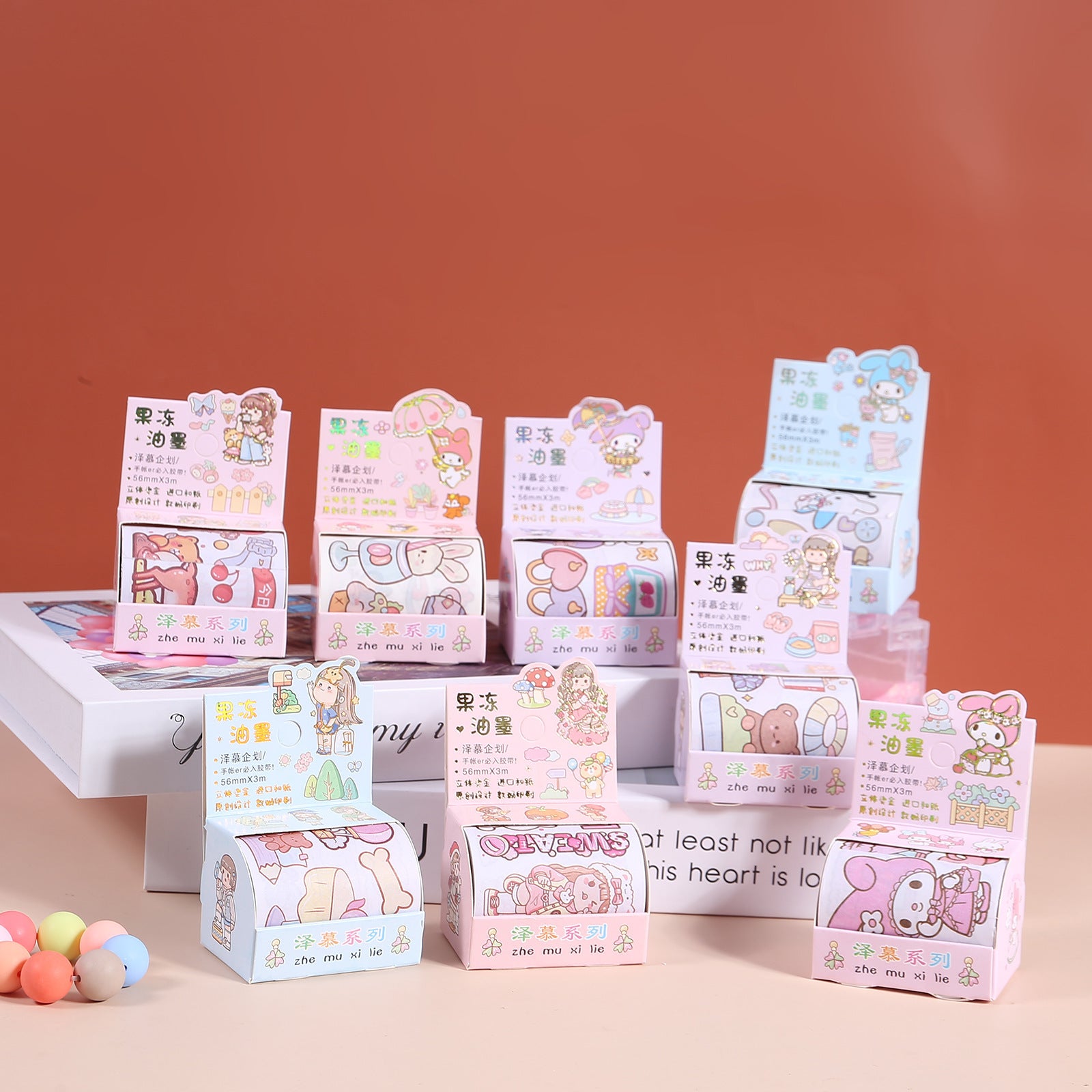 Collection of pastel jelly ink tape sticker rolls with decorative designs for journaling, scrapbooking, planners, and creative projects