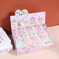Display box filled with assorted jelly ink tape sticker rolls featuring pastel decorative themes for planners and paper crafts