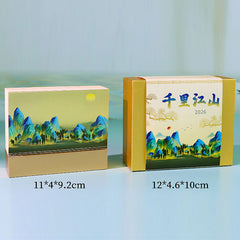 Chinese landscape paper memo pad with colorful layered mountains and desktop packaging