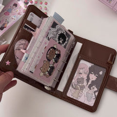 Open M5 chocolate brown PU planner with loose-leaf inserts, pockets and decorative journaling accessories
