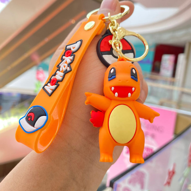 Orange soft silicone creature keychain with gold-tone ring