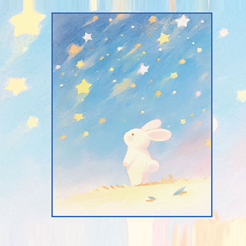 Pastel bunny note paper with colorful stars across a blue sky