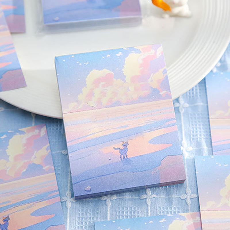 Pastel ocean notebook featuring dreamy clouds and soft pink-blue waves