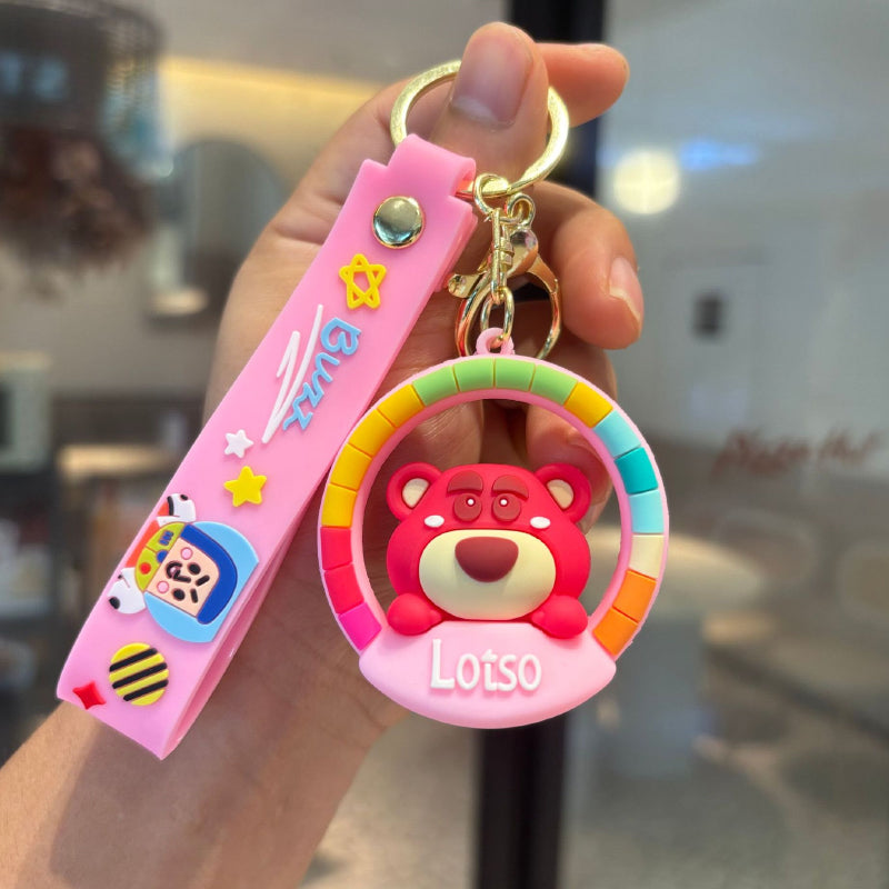 Pink bear rubber pendant keychain with pink strap and multicolor frame