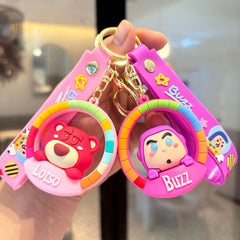Pink bear and space character rubber keychains with colorful round pendant frames