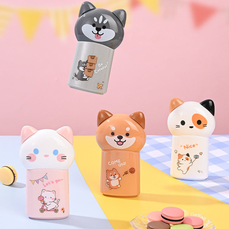 White, Pink, Gray and orange Pom-Pot correction tape dispensers