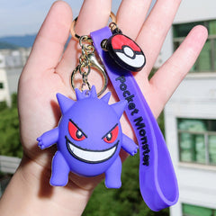 Purple silicone creature keychain with matching wrist strap
