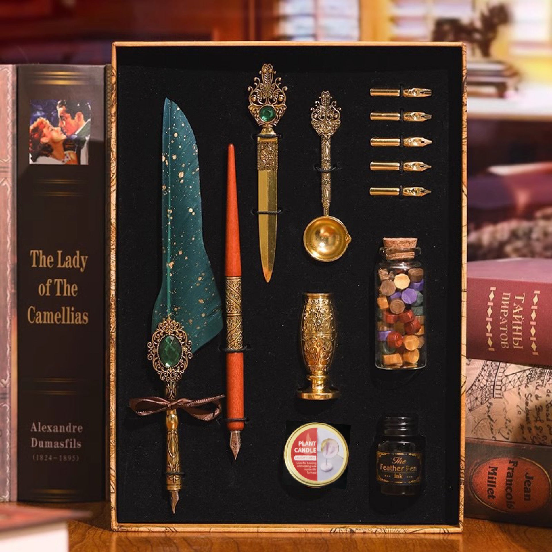 Green feather quill writing gift set with ink, nibs and wax seal accessories