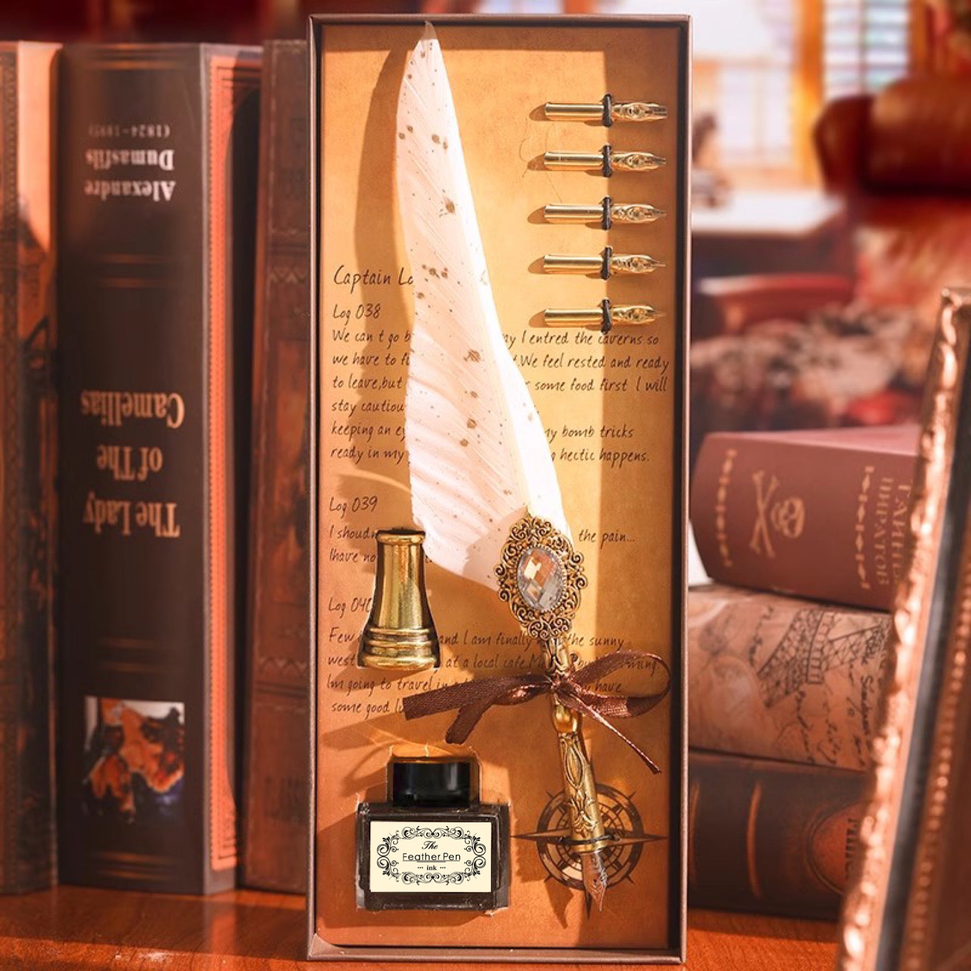 White feather quill pen gift set with brass accessories and ink