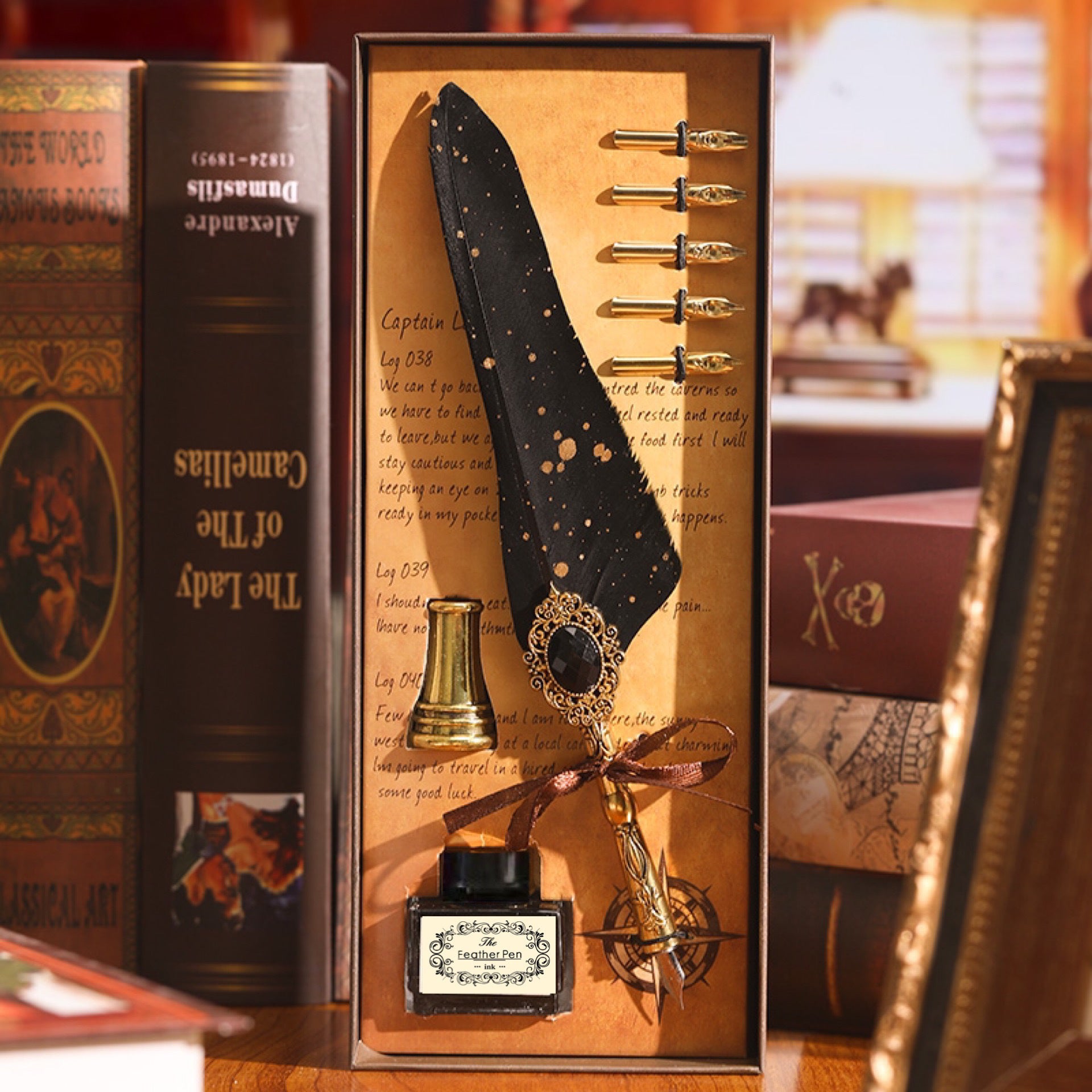 Black feather quill pen set with gold inkwell and nibs