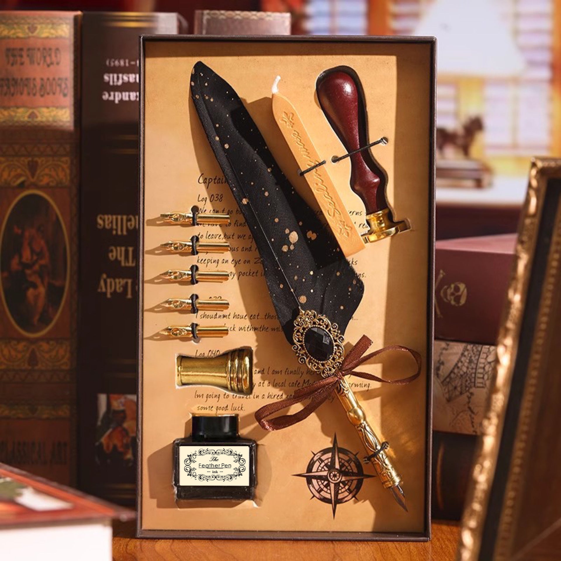 Dark feather quill gift set with gold ink bottle and wax seal stamp