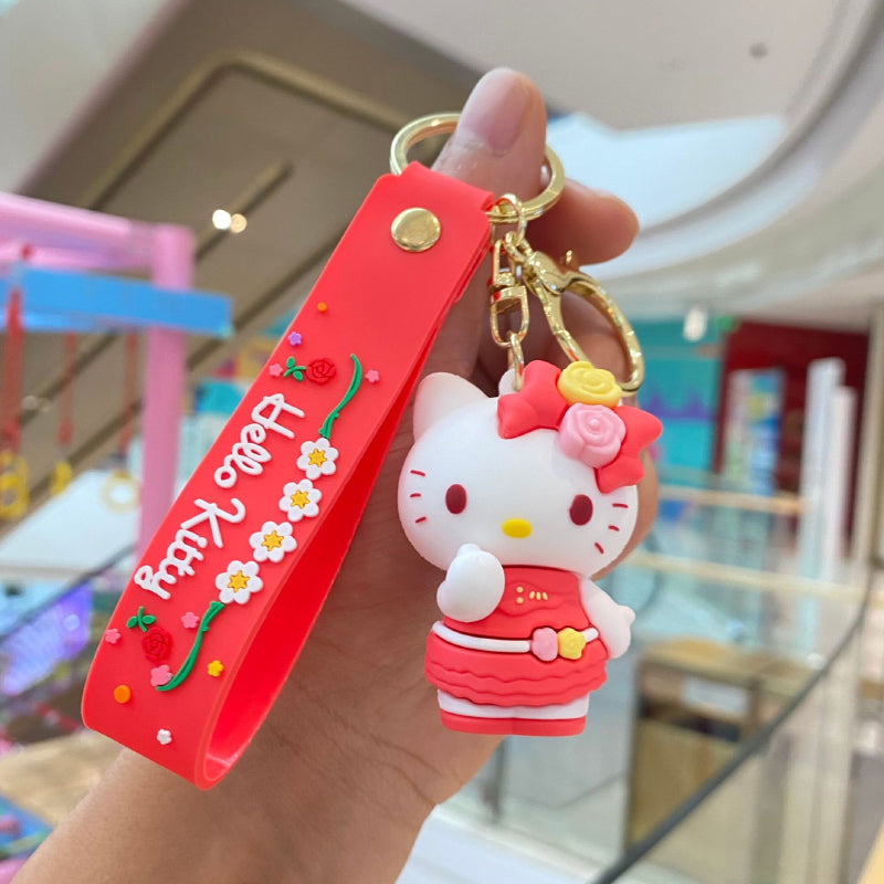 Red floral 3D doll keychain with decorative strap