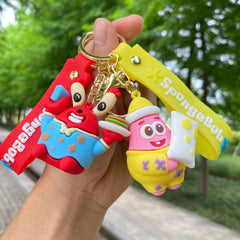 Red crab and pink sea-creature keychains with colorful rubber pendants