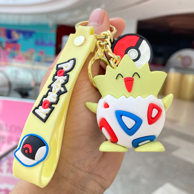 Yellow cartoon creature keychain with soft silicone figure
