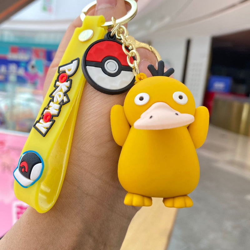 Yellow silicone creature keychain with matching wrist strap
