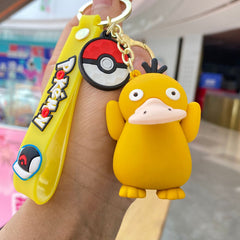 Yellow silicone creature keychain with matching wrist strap