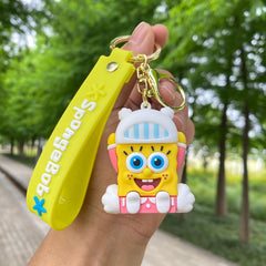 Yellow square character keychain with soft rubber pendant and wrist strap